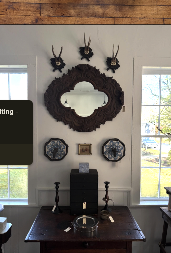 mirrored display with pottery